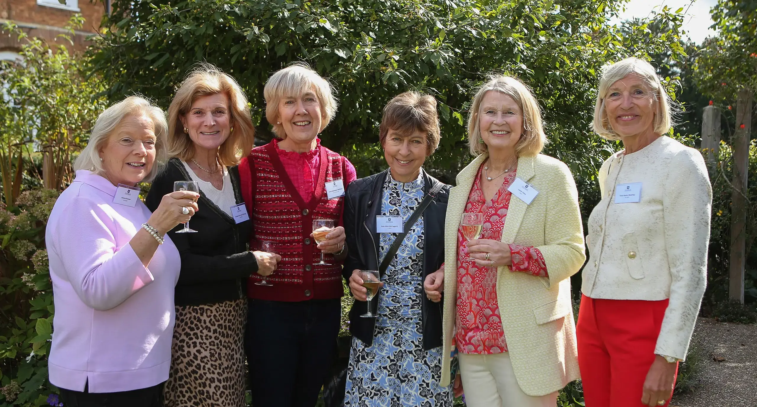 Inspirational women at St Swithun's private school for girls in Winchester smiling outside