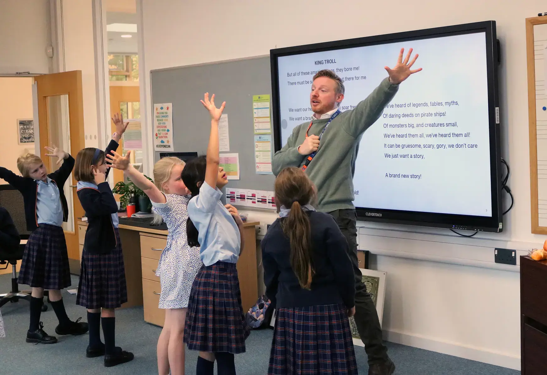 girls at St Swithun's Prep School singing and dancing in music class