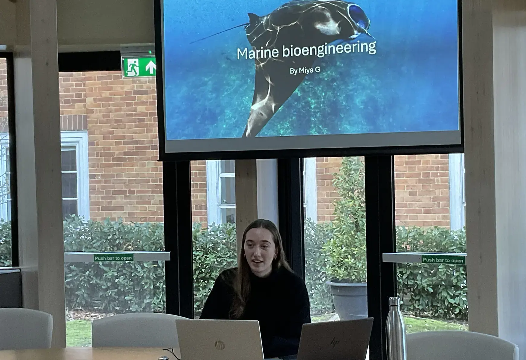Student at St Swithun's private School for girls in Winchester giving an academic presentation