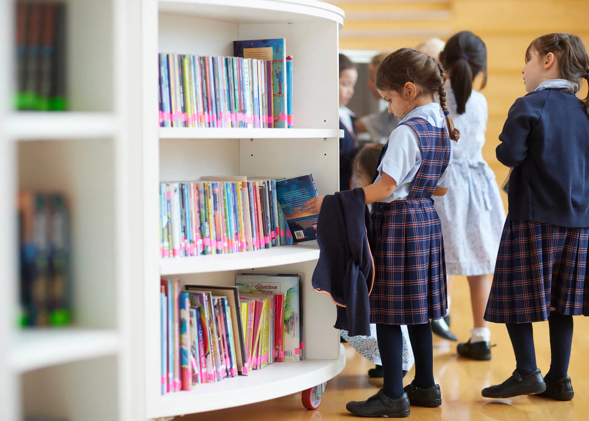 Prep pupil in library