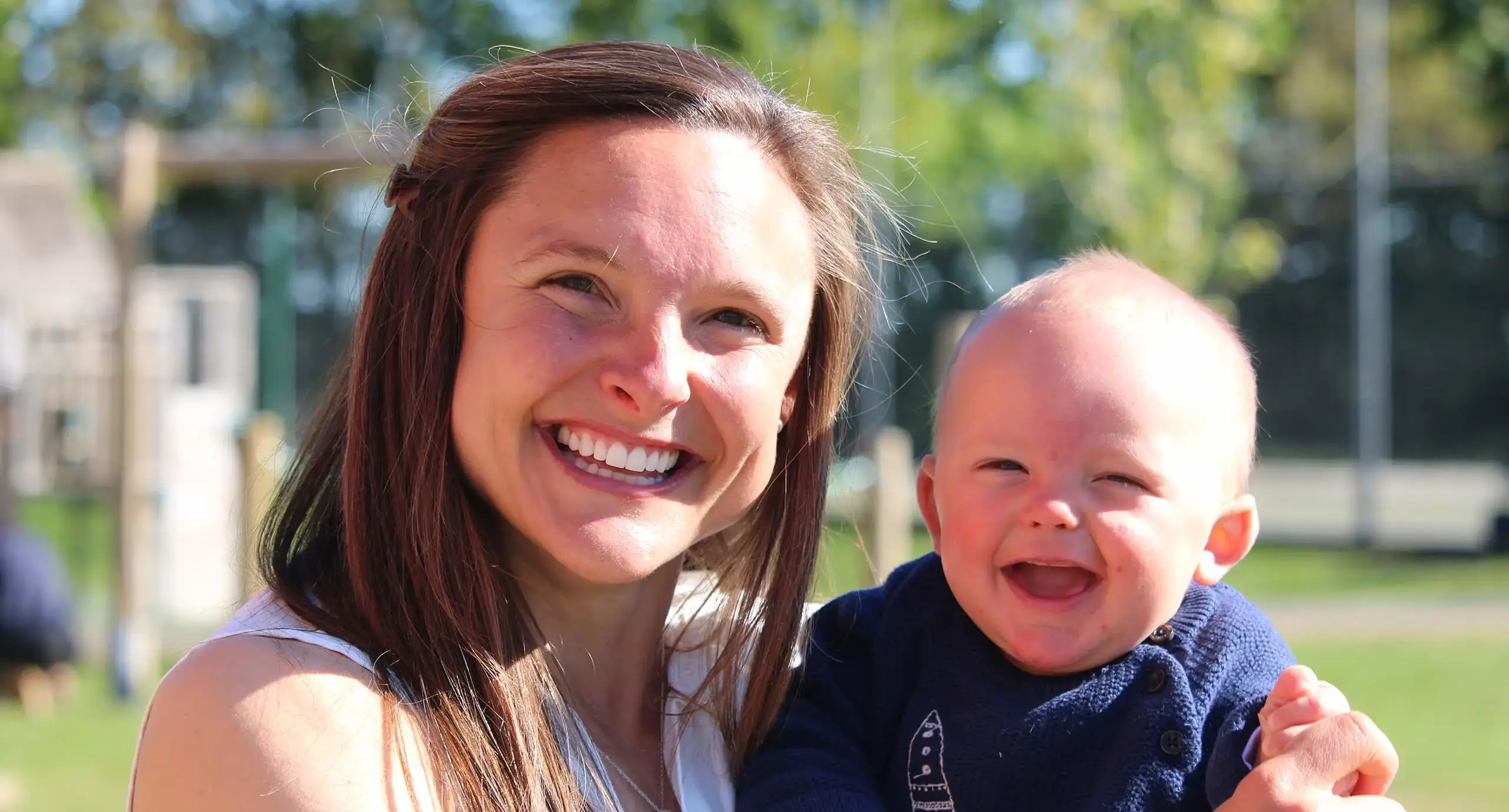 Nursery teacher with young child at St Swithun's