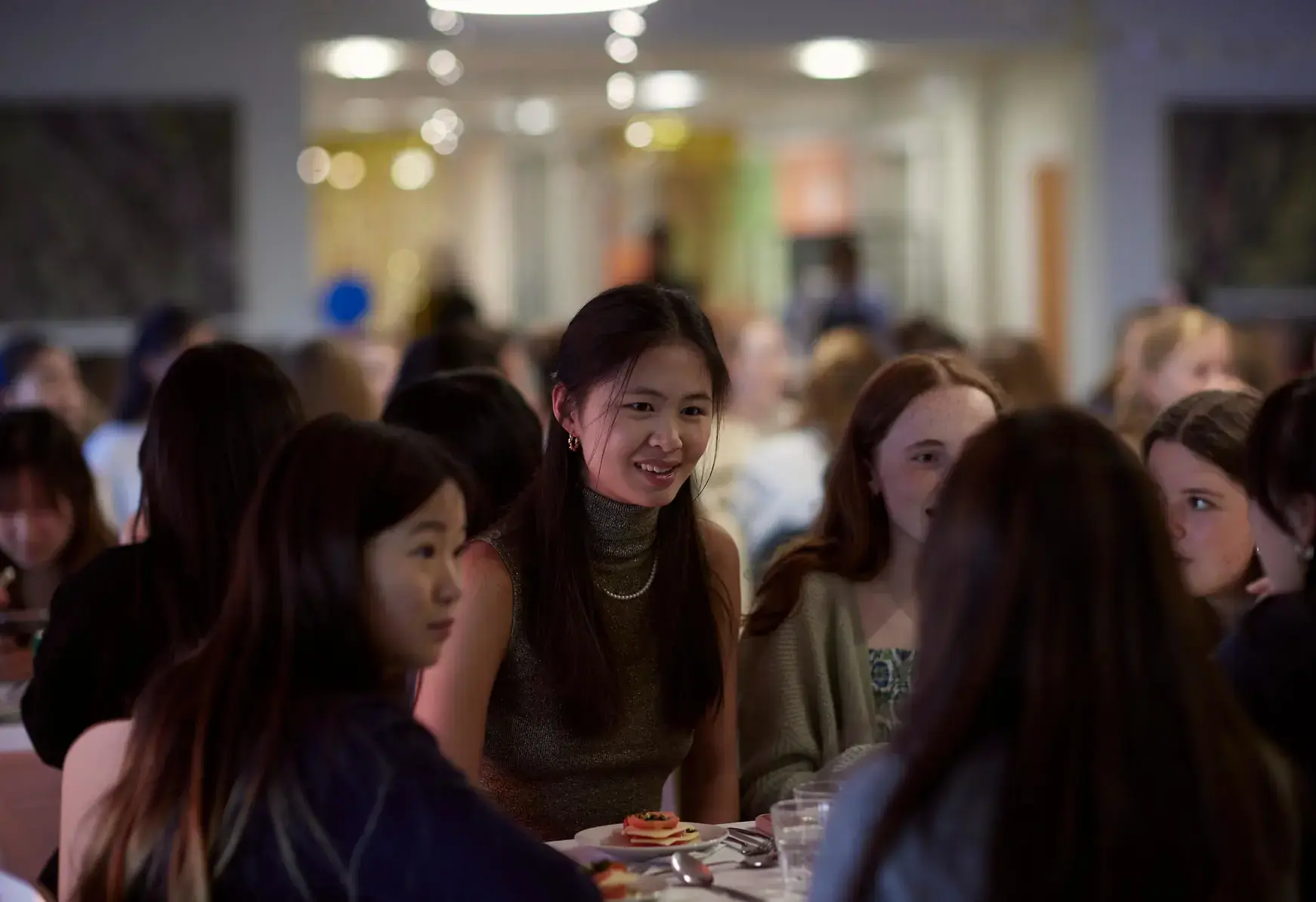 Students at St Swithun's School for girls in Hampshire outstanding A-level results Girls chatting at dinner at St Swithun's School for girls in Hampshire outstanding A-level results