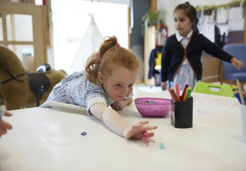 Pupil in class at St Swithun's School, a private school for girls in Hampshire