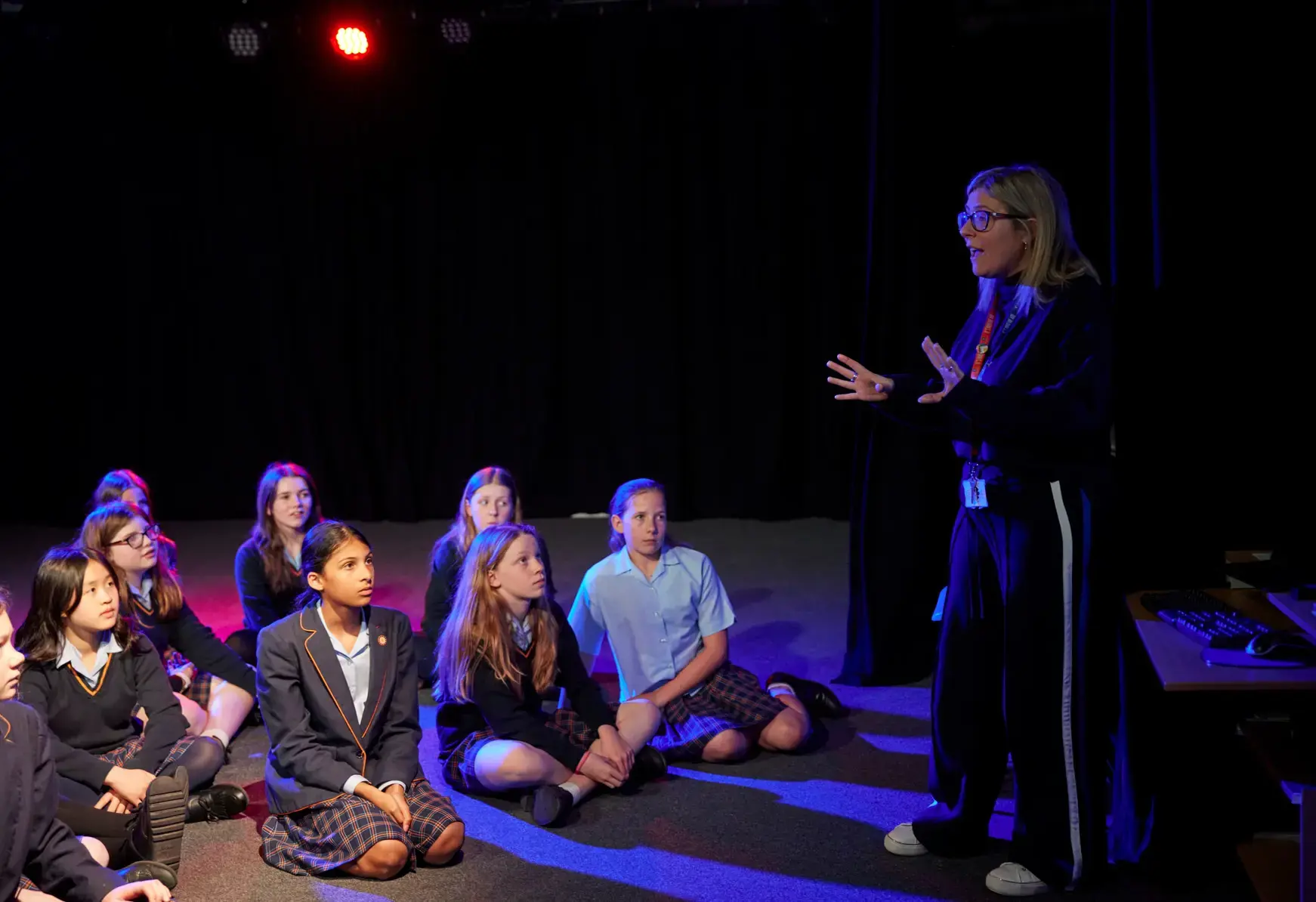 Teacher instructing students at St Swithun's, a private school in Hampshire