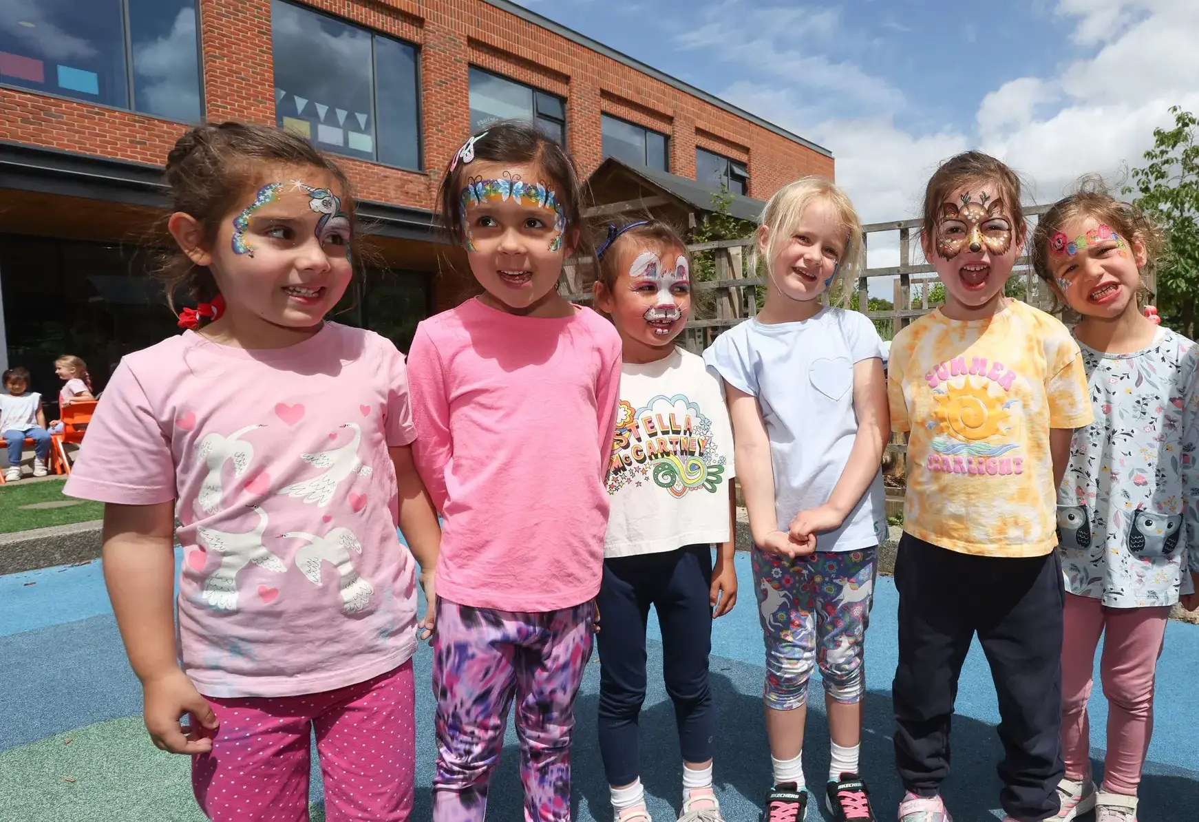 Pupils with facepaint outside