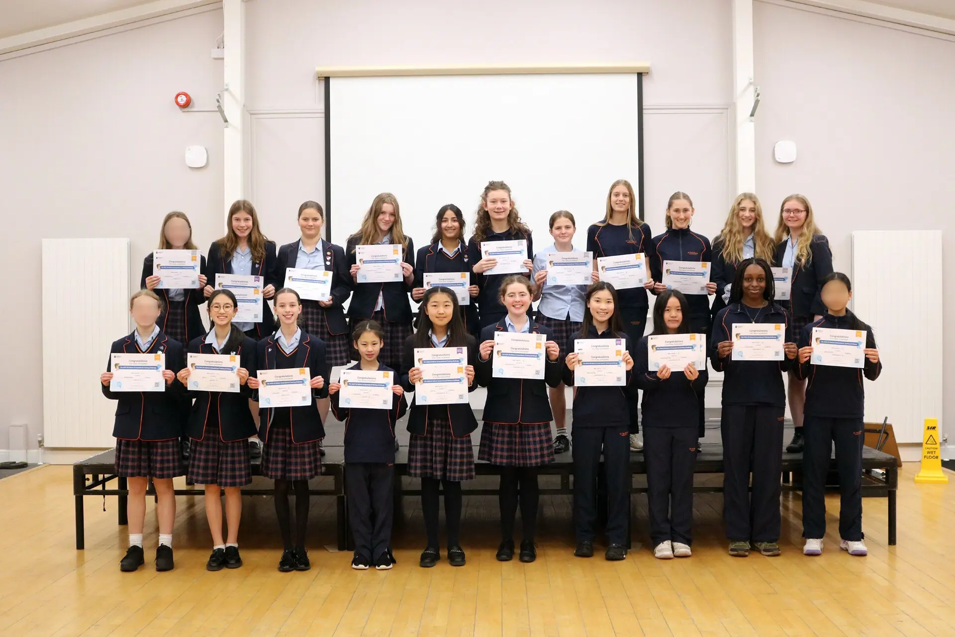 Students at St Swithun's School for girls in Hampshire with certificates for computer science | News | St Swithun's