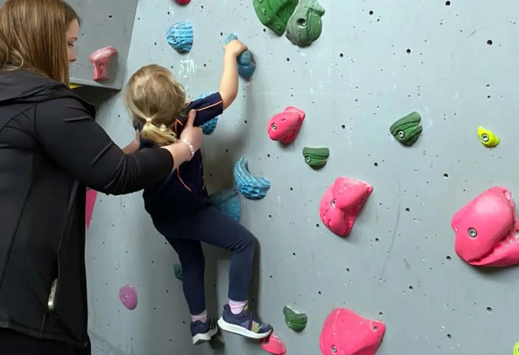 Preschool student rock climbing St Swithun's Winchester Hampshire