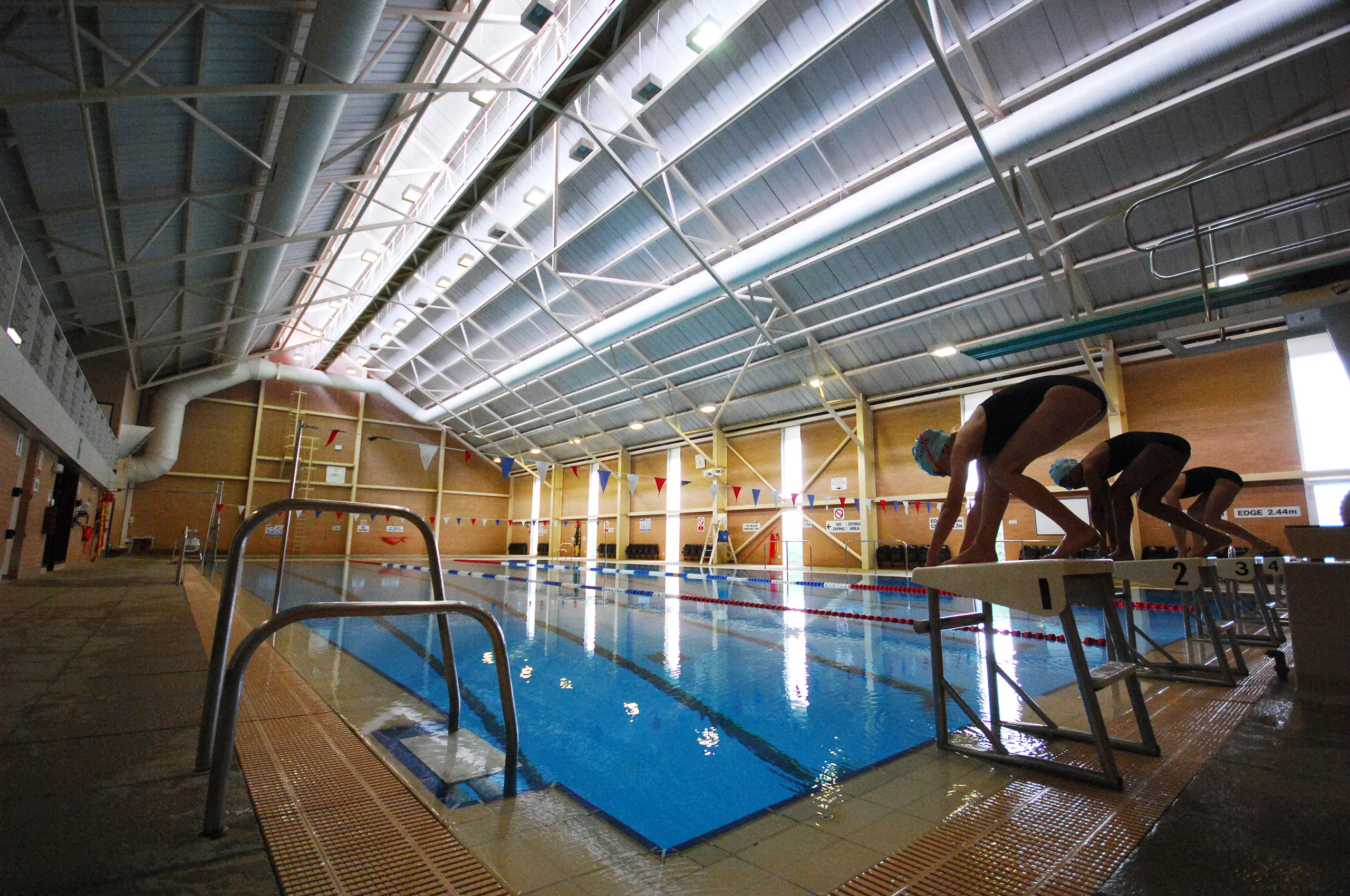 Divers at swimming pool facilities at St Swithun's school for girls in winchester